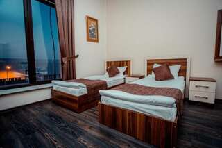 Хостелы Grand Qafqaz Hostel Гянджа Кровать в общем номере с 4 кроватями-1